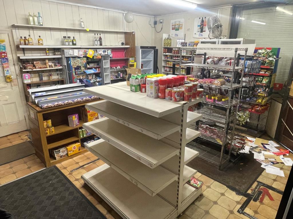 Lot: 57 - MIXED COMMERCIAL/RESIDENTIAL PROPERTY WITH POTENTIAL - Shop floor with shelving and counter area